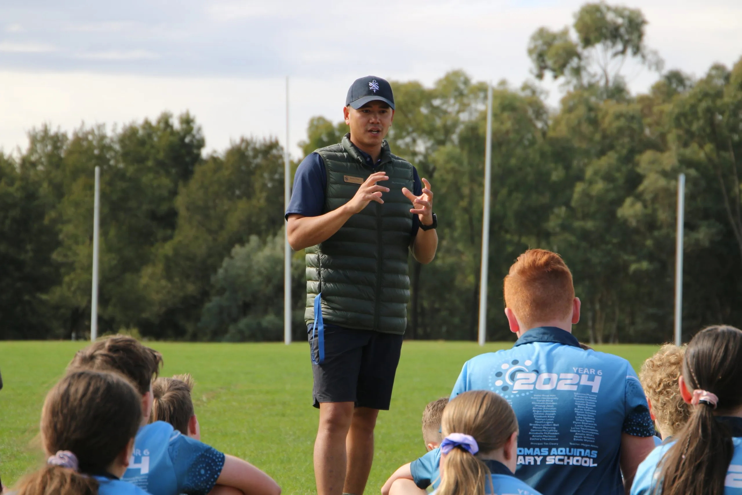 A teacher talking to some primary school students about SFX