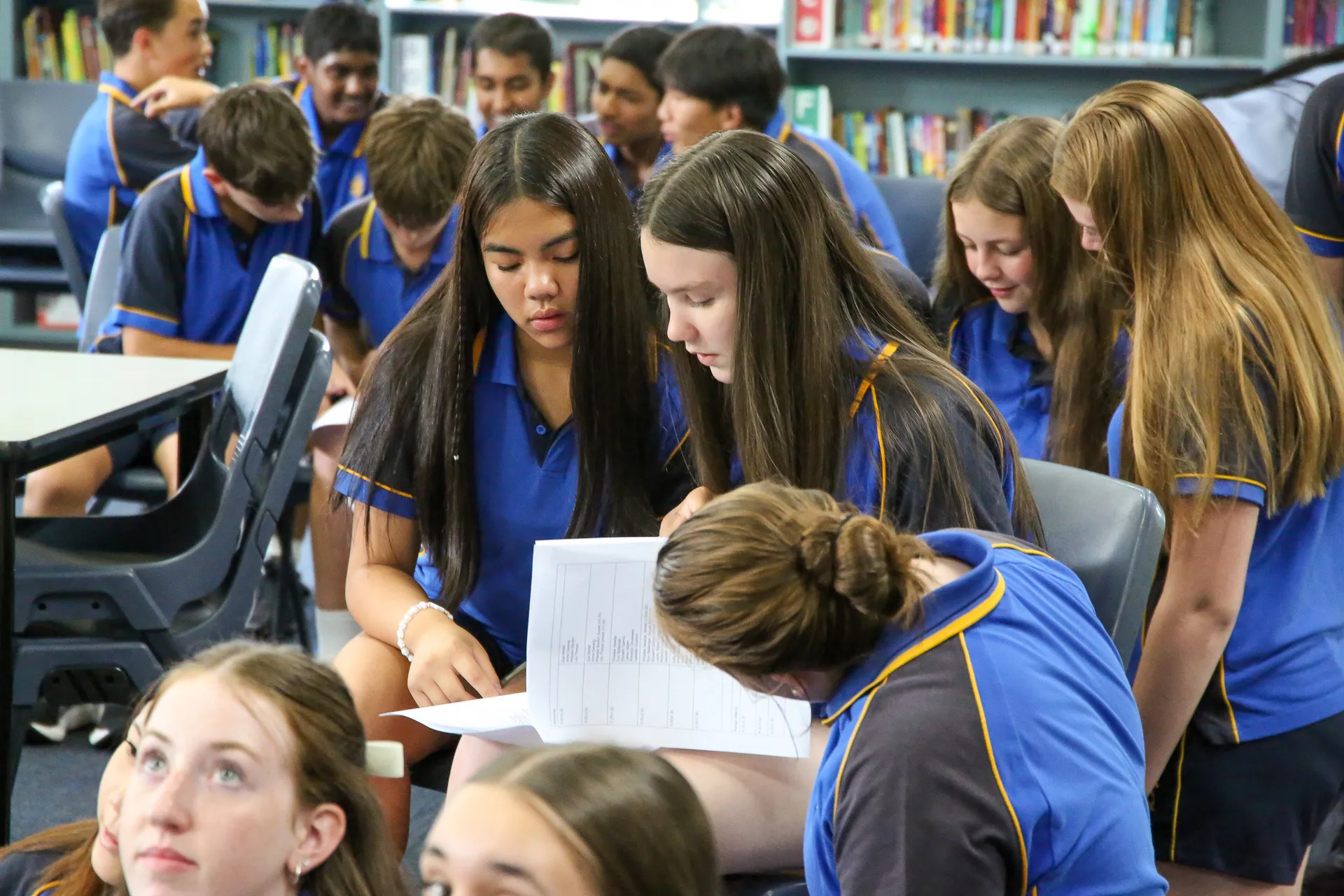 A group of students working together in a classroom