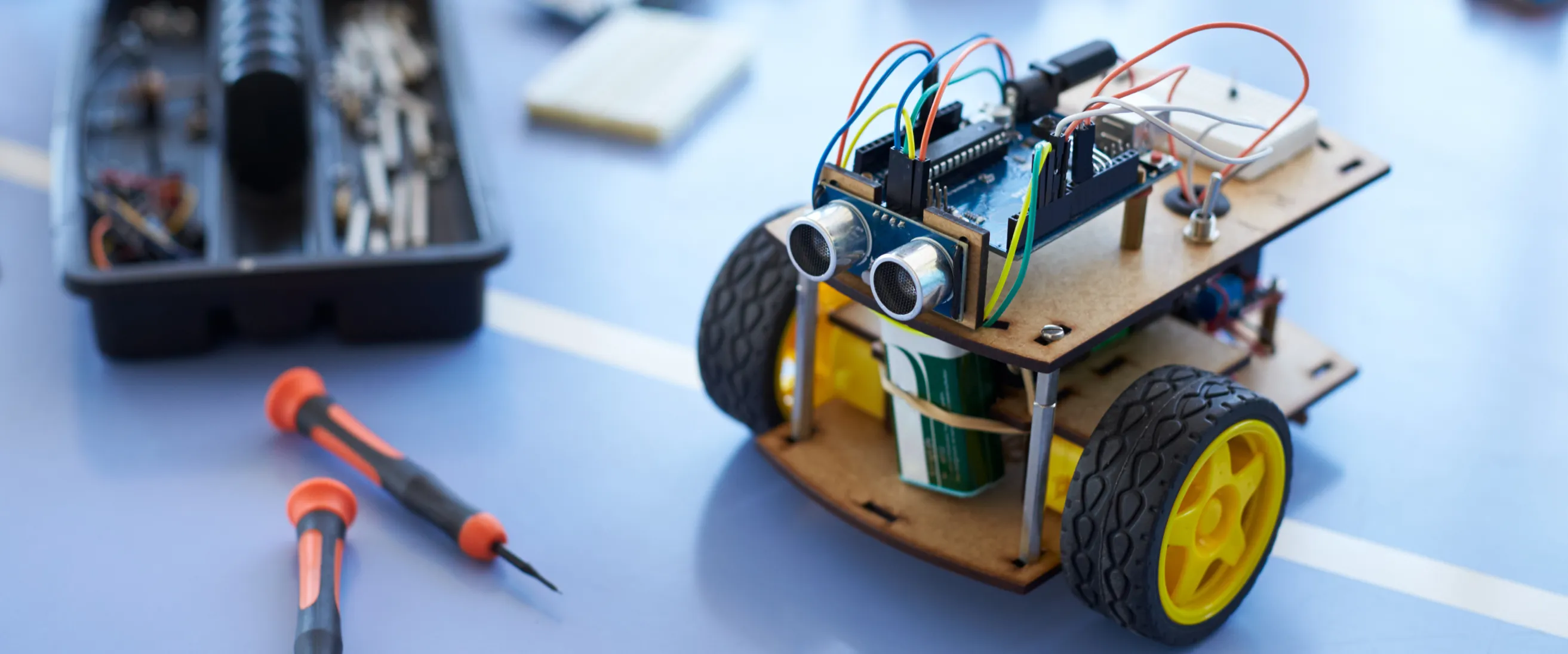 A partly built robot with wheels