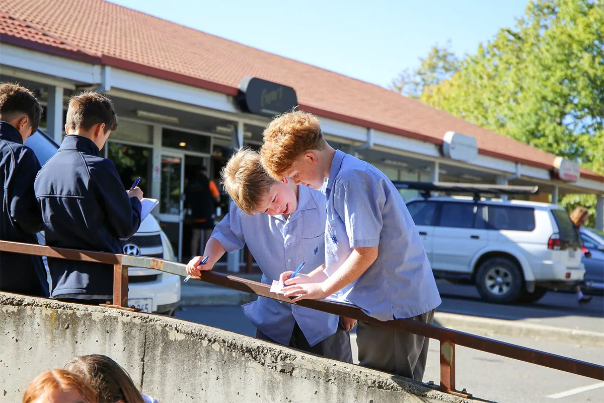 A group of students working outside